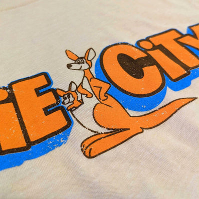 Kiddie City Toy Store T-Shirt Detail Kaycee And Baby Beige