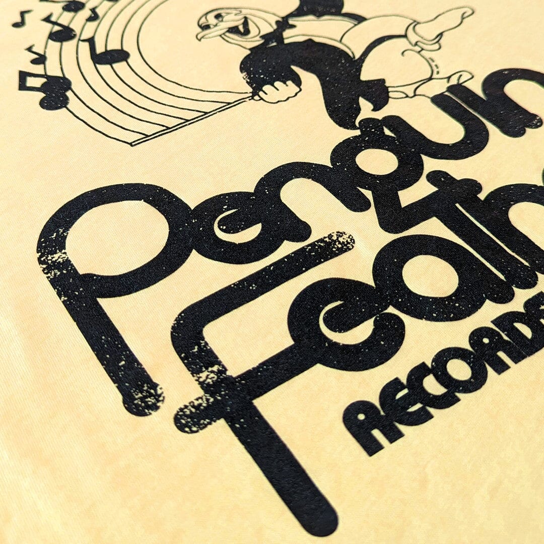 Penguin Feather Records And Tapes T-Shirt Detail Left Faded Yellow