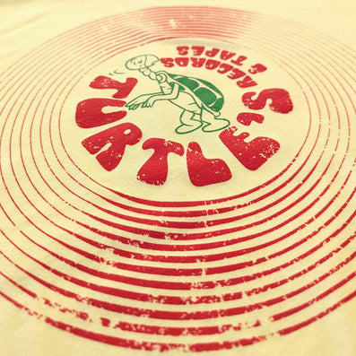 Turtle's Records And Tapes T-Shirt Detail Left Faded Yellow
